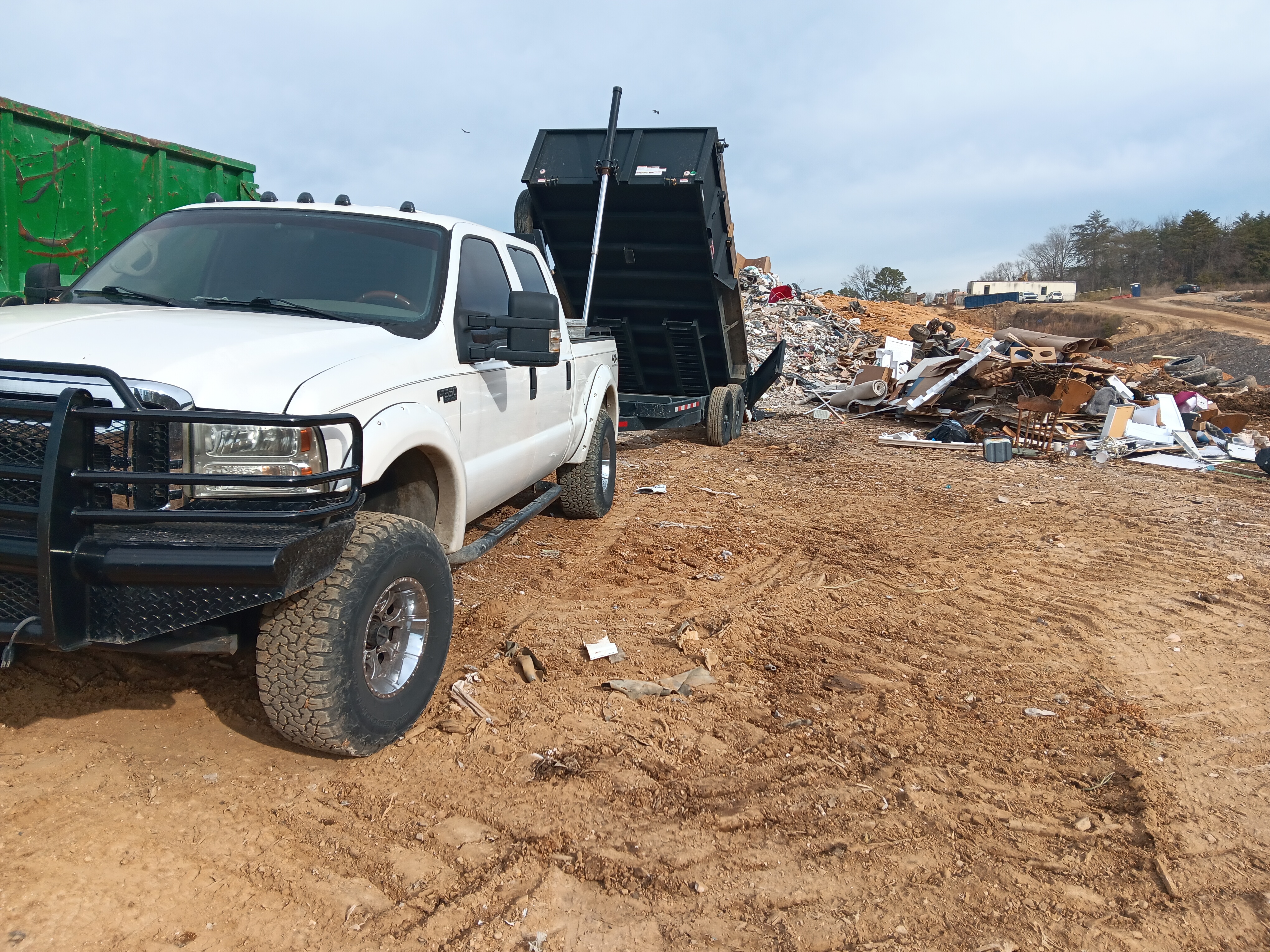 Pickup truck with dump trailer